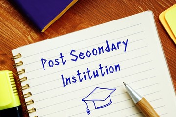 Business concept about Post Secondary Institution with phrase on the piece of paper.