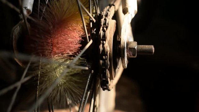 bicycle chain running in circle while paddling. the back wheel view with close up look. cycle repairing video clip