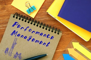 Business concept meaning Performance Management with sign on the page.