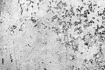 Texture of a concrete wall with cracks and scratches which can be used as a background