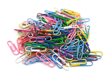 Paper clips isolate on white background.Paper clips is a device used to hold sheets of paper together, usually made of steel wire bent to a looped shape
