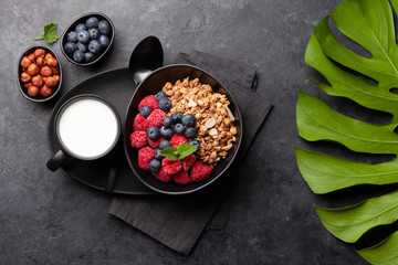 Healthy breakfast with granola, yogurt and berries
