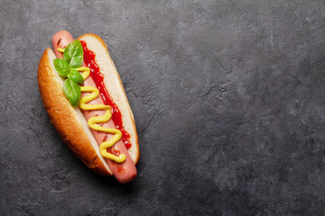 Hot dog with mustard and ketchup