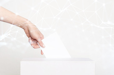 Voter Holding Ballot For Remote Voting