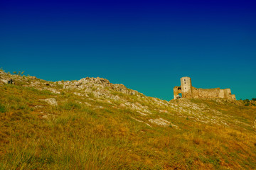 Fototapeta premium the medieval fortress on the hill in the sunlight