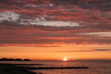 scenic seaside with blood red sky 