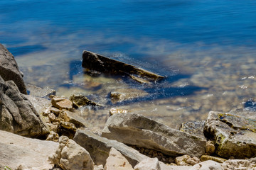 Long Exposure of Large Rocks in a Lake