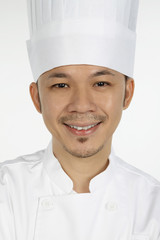 Asian chef smiling