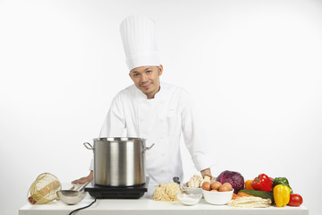 Asian chef preparing a wholesome meal
