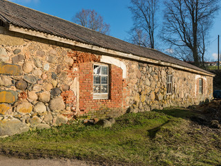 Fototapeta na wymiar landscape with a stone barn