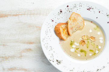 Mushroom cream soup. Top view. Free space for your text.