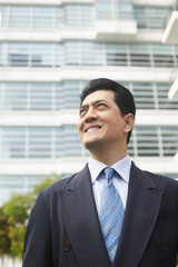Fototapeta premium Confident businessman smiling