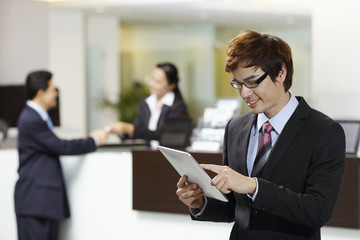 Businessman using digital tablet