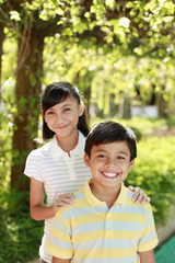 Boy and girl together, smiling