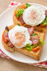 whole wheat bread toasted with vegetable, bacon and egg