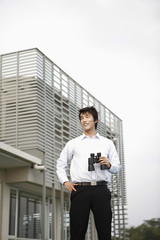 Businessman with binoculars