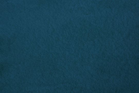 Textured dark blue paper texture background