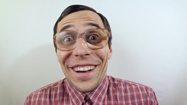 Surprised funny man in glasses