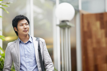 Businessman walking outdoors