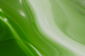 White and green swirl patterned background
