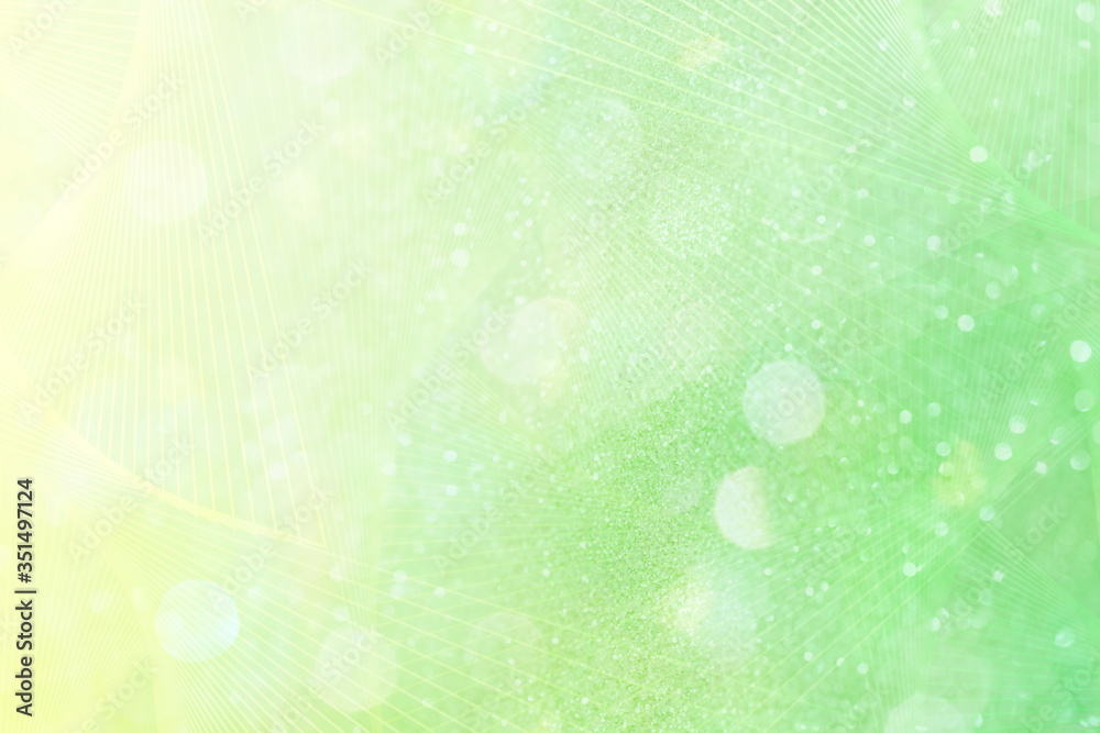 Wall mural bokeh pattern on a yellowish green background