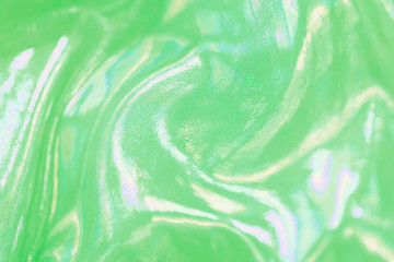 Green holographic textured background