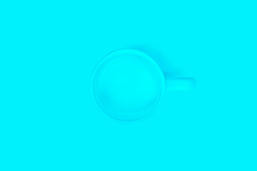 Blue cup on a blue background.