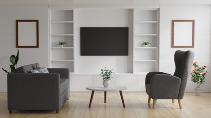 TV in the modern living room on the white wall has a table and sofa in front.