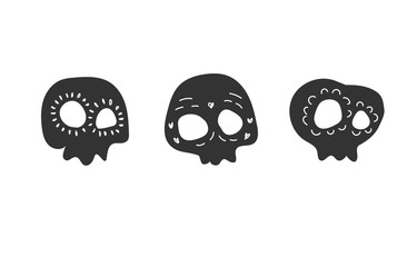 Painted black skulls. Stock vector illustration