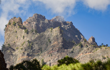 Fototapeta na wymiar Steep Mountain rocks of El Roque de los Muchachos in Caldera del taburiente, La Palma, Spain.