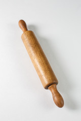 Rolling pin for dough on a white background