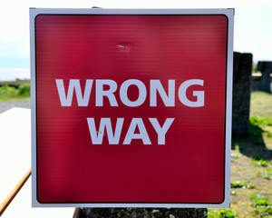 Wrong way pedestrian sign