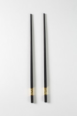 Chinese sticks in black on a white background
