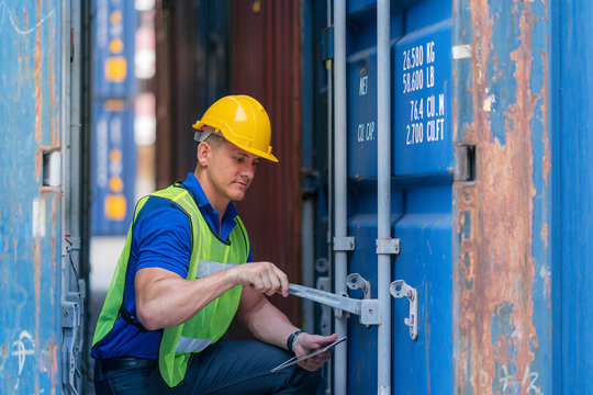 Inspector/Foreman/Engineer Working On Equipment Inspection At Container Yard