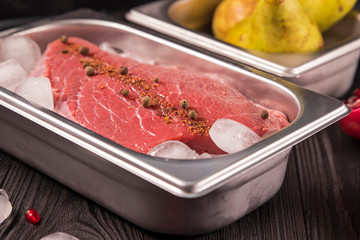 fresh meat with spices in ice