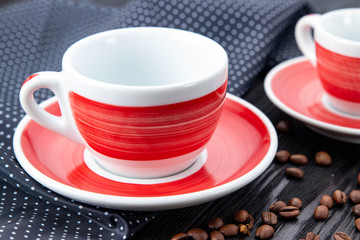 Red coffee cup on black background