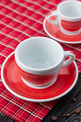 Red coffee cup on black background