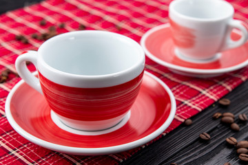 Red coffee cup on black background
