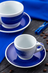 blue cups on a gray background