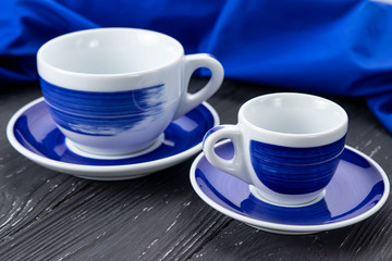 blue cups on a gray background
