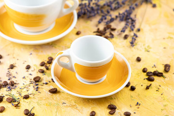 yellow coffee cup on yellow background