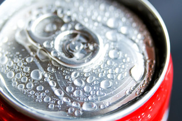 Macro photography of cold popular can drink full of water condensed during hot day.