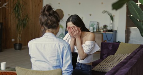 Two female friends with tablet computer