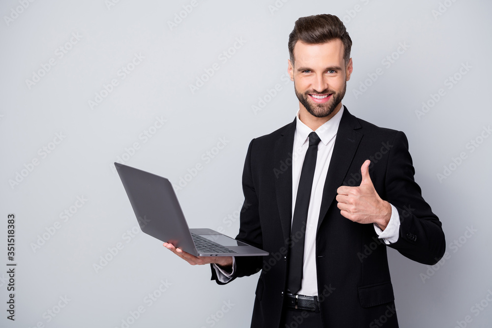 Sticker Portrait of confident brunette hair man ceo worker approve his work show thumb up hold computer wear classy formalwear outfit isolated over grey color background