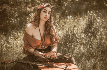 Gypsy lifestyle, gypsy modern romale girl at nature