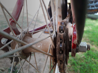 Closeup of dusty chain and excel of a bike or bicycle