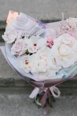 Beautiful bouquet of flowers. Flowers in the frame. Floristry and flower shop concept.