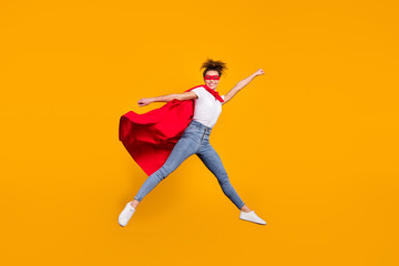 Fototapeta na wymiar Full length body size view of her she nice attractive lovely strong motivated fit slim cheerful cheery girl jumping wearing mantle isolated on bright vivid shine vibrant yellow color background