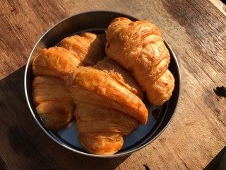 Delicious breakfast with fresh croissants. French croissant. Freshly baked croissants.