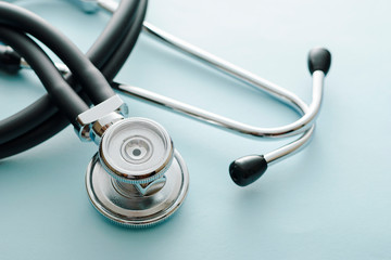 Coiled stethoscope from above on white